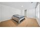 Cozy bedroom featuring carpet, a bed, and a door to another room at 13699 Inman Rd, Hampton, GA 30228