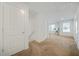 Upstairs living room with access to a bathroom at 13699 Inman Rd, Hampton, GA 30228