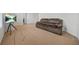 Spacious living room with a couch at 13699 Inman Rd, Hampton, GA 30228