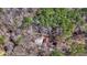 Aerial view of a home nestled among dense trees, showcasing the property's secluded and private location at 166 Muse Rd, Fayetteville, GA 30214