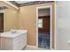 Bathroom featuring vanity sink and toilet with wallpaper border at 166 Muse Rd, Fayetteville, GA 30214
