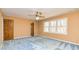 Bedroom with an overhead fan and large windows to let in light at 166 Muse Rd, Fayetteville, GA 30214