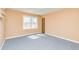Bedroom featuring a window and door at 166 Muse Rd, Fayetteville, GA 30214