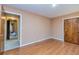 Bright bedroom with wood floors, neutral walls and closet space at 166 Muse Rd, Fayetteville, GA 30214