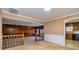 Open-concept living area with classic wood trim accents and seamless access to the adjacent kitchen at 166 Muse Rd, Fayetteville, GA 30214