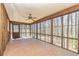 Enjoy the scenery in this sunroom that boasts tile flooring, a ceiling fan, and lots of natural light at 166 Muse Rd, Fayetteville, GA 30214