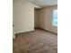 Bedroom with a walk-in closet and a large window for natural light at 2056 Belmont Cir, Conyers, GA 30012