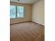 Bedroom featuring two bright windows and neutral-colored carpet at 2056 Belmont Cir, Conyers, GA 30012