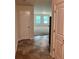 Welcoming foyer with tile flooring that leads to a spacious living area at 2056 Belmont Cir, Conyers, GA 30012