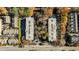 Aerial view of a residential community with mature trees, showing building layout and neighborhood surroundings at 3201 Lenox Ne Rd # 23, Atlanta, GA 30324