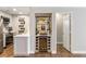 Wet bar area featuring a wine fridge and modern shelving at 3201 Lenox Ne Rd # 23, Atlanta, GA 30324