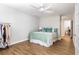 Inviting bedroom with neutral walls, hardwood flooring and a cozy bed at 3201 Lenox Ne Rd # 23, Atlanta, GA 30324
