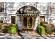 Building entrance with manicured landscaping and awning at 3201 Lenox Ne Rd # 23, Atlanta, GA 30324