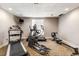 Home gym featuring a treadmill, elliptical machine and rowing machine at 3201 Lenox Ne Rd # 23, Atlanta, GA 30324