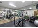 Home gym featuring weight machines, free weights and mirrored walls at 3201 Lenox Ne Rd # 23, Atlanta, GA 30324