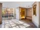 Well-lit hallway with a gold elevator, large windows, and stylish carpet at 3201 Lenox Ne Rd # 23, Atlanta, GA 30324