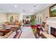 Bright living room featuring a fireplace, comfortable seating and Christmas decor at 3201 Lenox Ne Rd # 23, Atlanta, GA 30324