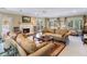 Comfortable living room featuring a fireplace, plush sofas, and natural light at 3201 Lenox Ne Rd # 23, Atlanta, GA 30324