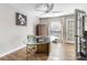 Bright office features hardwood floors, natural light, glass table, and neutral decor at 3201 Lenox Ne Rd # 23, Atlanta, GA 30324