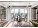 Bright sitting area featuring a small table and chairs next to french doors at 3201 Lenox Ne Rd # 23, Atlanta, GA 30324