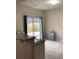Bright kitchen area featuring granite countertops and backyard access at 2546 Tullamore Cir, Snellville, GA 30039
