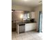 Open kitchen featuring white cabinets, stainless steel appliances, and granite countertops at 2546 Tullamore Cir, Snellville, GA 30039