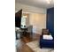 Open-concept area showcasing the hardwood floors and seamlessly blending living room into dining at 2546 Tullamore Cir, Snellville, GA 30039