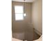 Well-lit stairwell with overhead lighting and access to the lower level at 2546 Tullamore Cir, Snellville, GA 30039