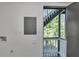 Back porch features an entrance, a wooded view, an electrical box and a utility hookup at 353 Colchester Dr, Stone Mountain, GA 30088