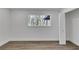 Bright bedroom boasts a window view and white interior, creating a clean, inviting space at 353 Colchester Dr, Stone Mountain, GA 30088
