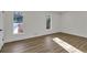 Well lit, spacious bedroom featuring new floors and recessed lighting at 353 Colchester Dr, Stone Mountain, GA 30088