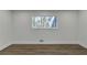 Modern bedroom with hardwood floors and a view at 353 Colchester Dr, Stone Mountain, GA 30088
