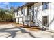 The exterior is a modern two-story home with a front porch and updated facade at 353 Colchester Dr, Stone Mountain, GA 30088