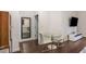 Cozy dining area with a glass table, stylish chairs, and a modern accent mirror at 870 Inman Village Ne Pkwy # 222, Atlanta, GA 30307