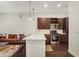 Modern kitchen featuring stainless appliances, quartz counters, and dark wood cabinets at 870 Inman Village Ne Pkwy # 222, Atlanta, GA 30307