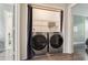 Convenient laundry area with front-load washer and dryer at 122 Belmonte Sw Dr, Atlanta, GA 30311