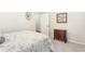 Bright bedroom featuring neutral walls, plush carpeting, and a view into an adjoining room at 1874 Manor View Nw Cir # 4, Acworth, GA 30101