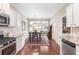 Modern kitchen boasts stainless steel appliances, granite countertops, and a seamless transition to the dining area at 1874 Manor View Nw Cir # 4, Acworth, GA 30101