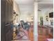 Elegant living room featuring hardwood floors, open floorplan, and a fireplace at 1874 Manor View Nw Cir # 4, Acworth, GA 30101