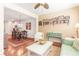 Inviting living room adjacent to the kitchen with hardwood floors and ample natural light at 1874 Manor View Nw Cir # 4, Acworth, GA 30101