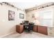 Functional home office with generous desk area, shelving, and comfortable seating for productivity at 1874 Manor View Nw Cir # 4, Acworth, GA 30101