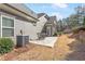 Home features a patio with an outdoor seating area and a view of the landscaped backyard at 1874 Manor View Nw Cir # 4, Acworth, GA 30101