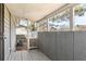 Covered back porch with wooden deck and railing overlooking the yard at 866 United Se Ave, Atlanta, GA 30312