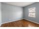 Inviting bedroom features hardwood flooring and a sunlit window at 866 United Se Ave, Atlanta, GA 30312
