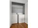 Handy closet laundry area featuring a washer, dryer, folding doors, and a wire shelf at 866 United Se Ave, Atlanta, GA 30312