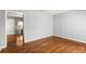 Bright living room featuring hardwood floors, a doorway, and a fresh, modern color scheme at 866 United Se Ave, Atlanta, GA 30312