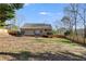 Spacious backyard with lawn and wood fence at 121 Fox Wood Ct, Villa Rica, GA 30180