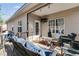 Comfortable covered patio perfect for outdoor entertaining and relaxation at 121 Fox Wood Ct, Villa Rica, GA 30180