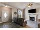 Bright and airy living room boasting vaulted ceilings, a cozy fireplace, and ample seating at 121 Fox Wood Ct, Villa Rica, GA 30180