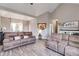 Spacious living area showcasing modern decor, wood floors, and an open layout at 121 Fox Wood Ct, Villa Rica, GA 30180